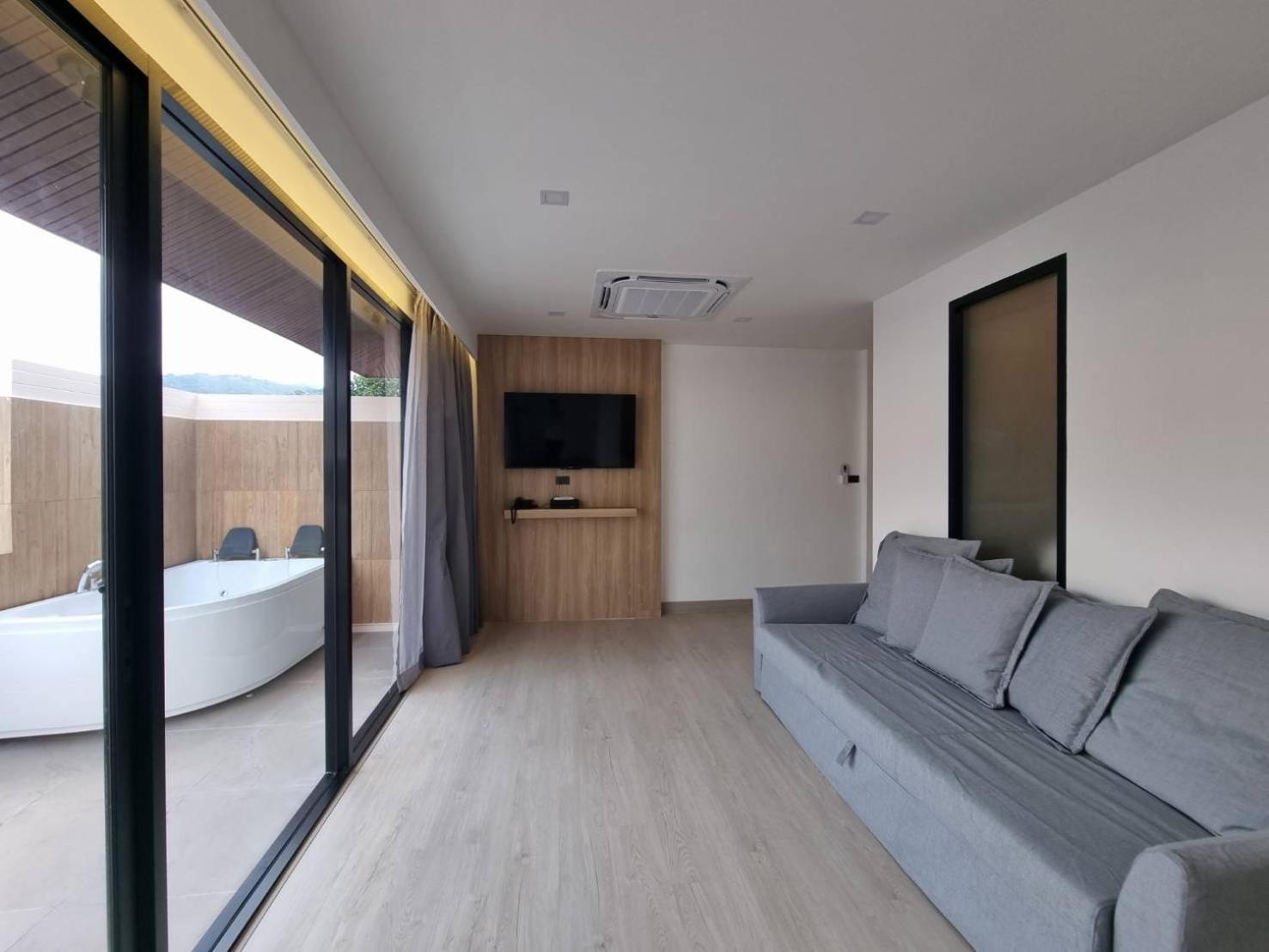Coconut Village Resort Phuket - Sha Extra Plus Patong Room photo